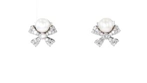 5mm Cultured Pearl and .25 ct. t.w. Diamond Bow Earrings in Sterling Silver