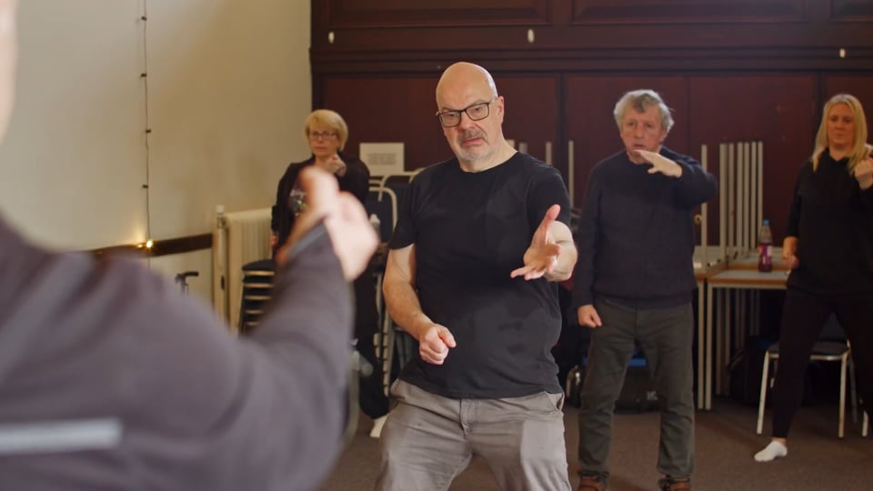 Class doing Tai Chi
