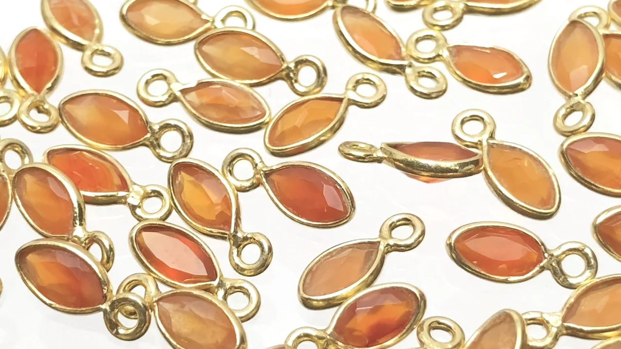 カーネリアン 枠留めマーキスファセットカット7×4mm 18KGP 5個｜天然石