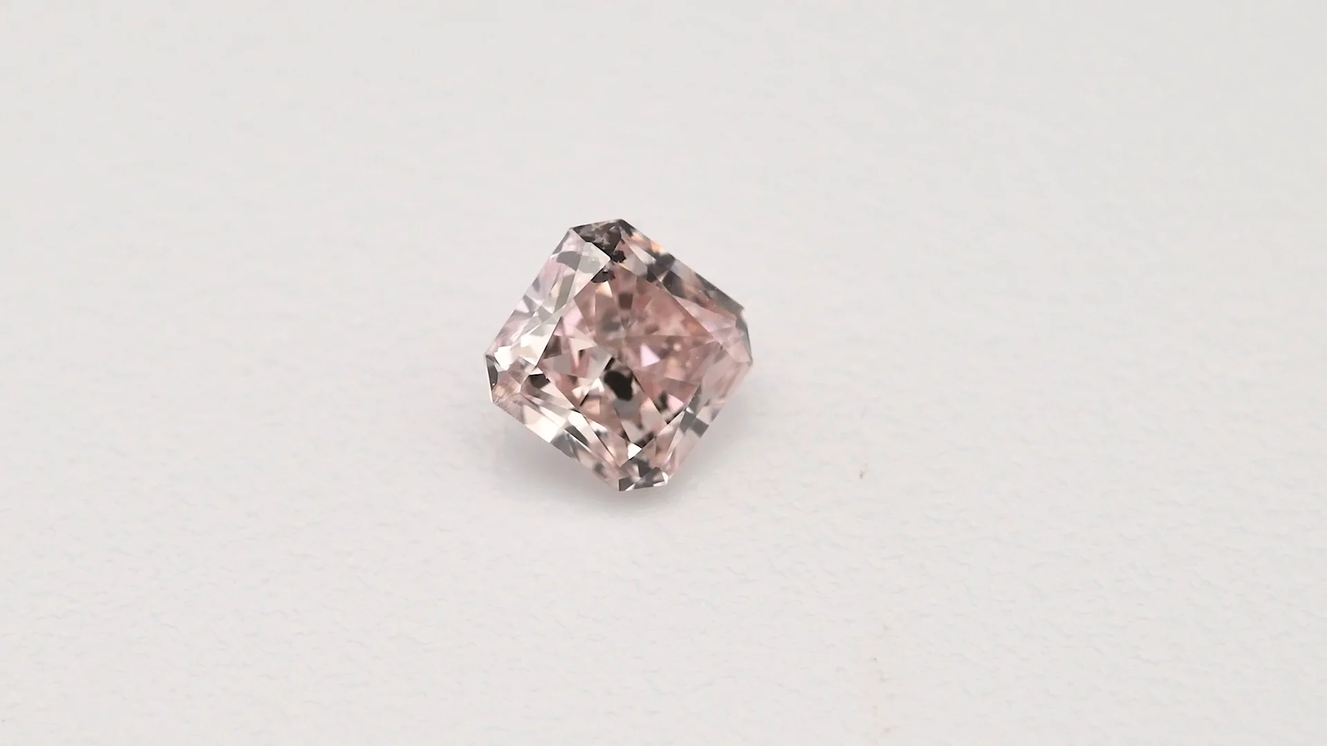 0.200 Ct Fancy Light Orangy Pink SI2 CGL Japan Natural Loose