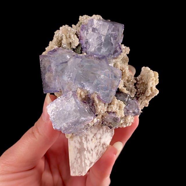 Fluorite (gemmy ''phantom'' crystals) with Muscovite on Quartz