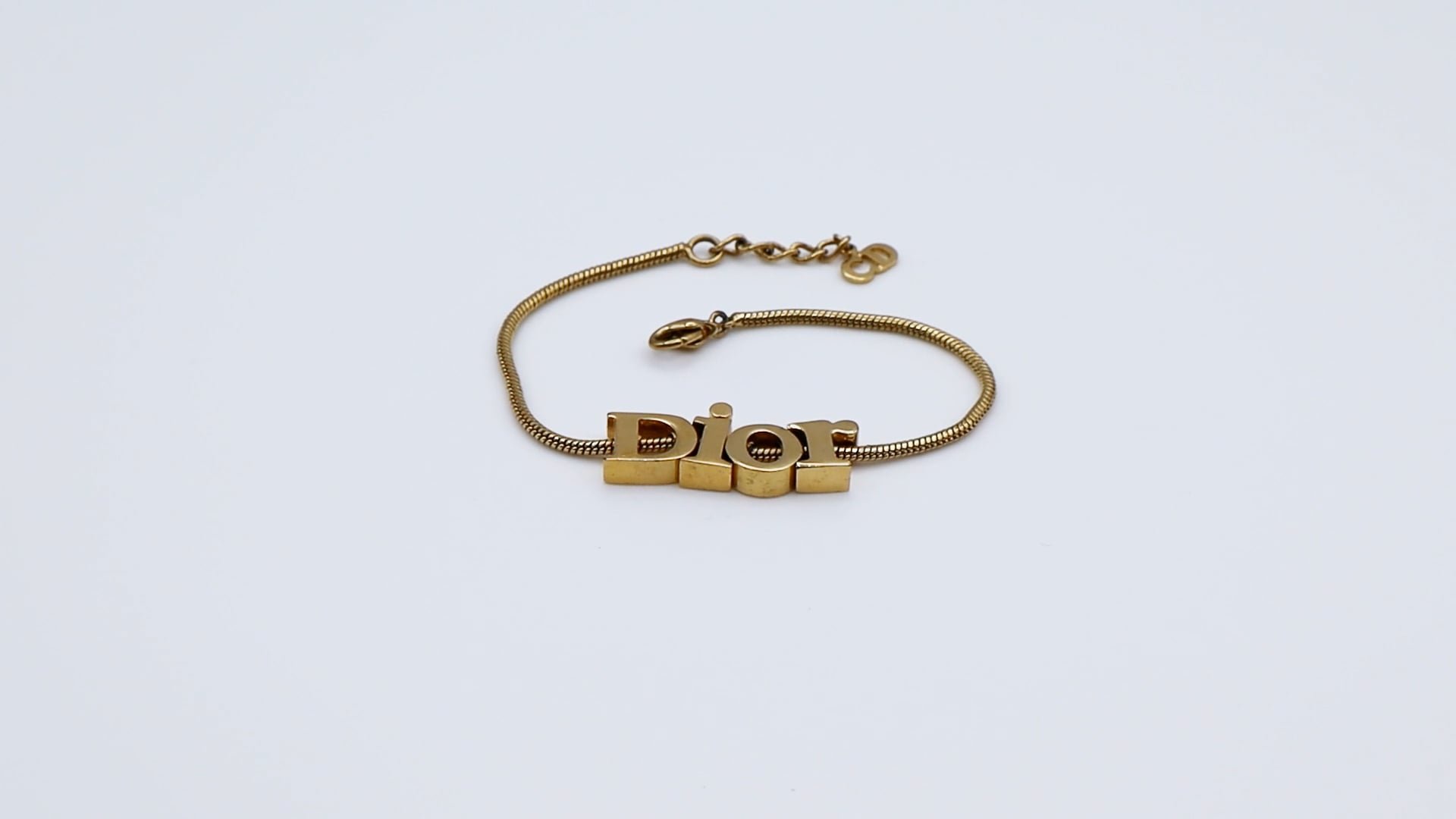 CHRISTIAN DIOR Vintage Gold Tone Spellout Bracelet For Sale at 
