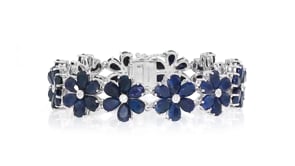 45.00 ct. t.w. Sapphire and .10 ct. t.w. Diamond Flower Bracelet in Sterling Silver