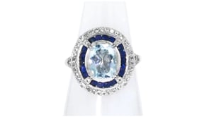 1.70 Carat Aquamarine and .50 ct. t.w. Sapphire Ring with .50 ct. t.w. White Topaz in Sterling Silver