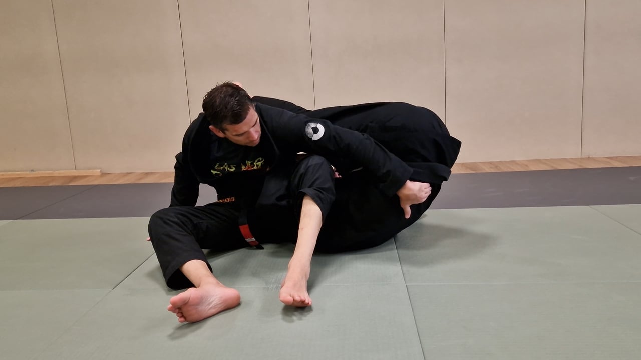 Défense d'omoplata en roulade avant