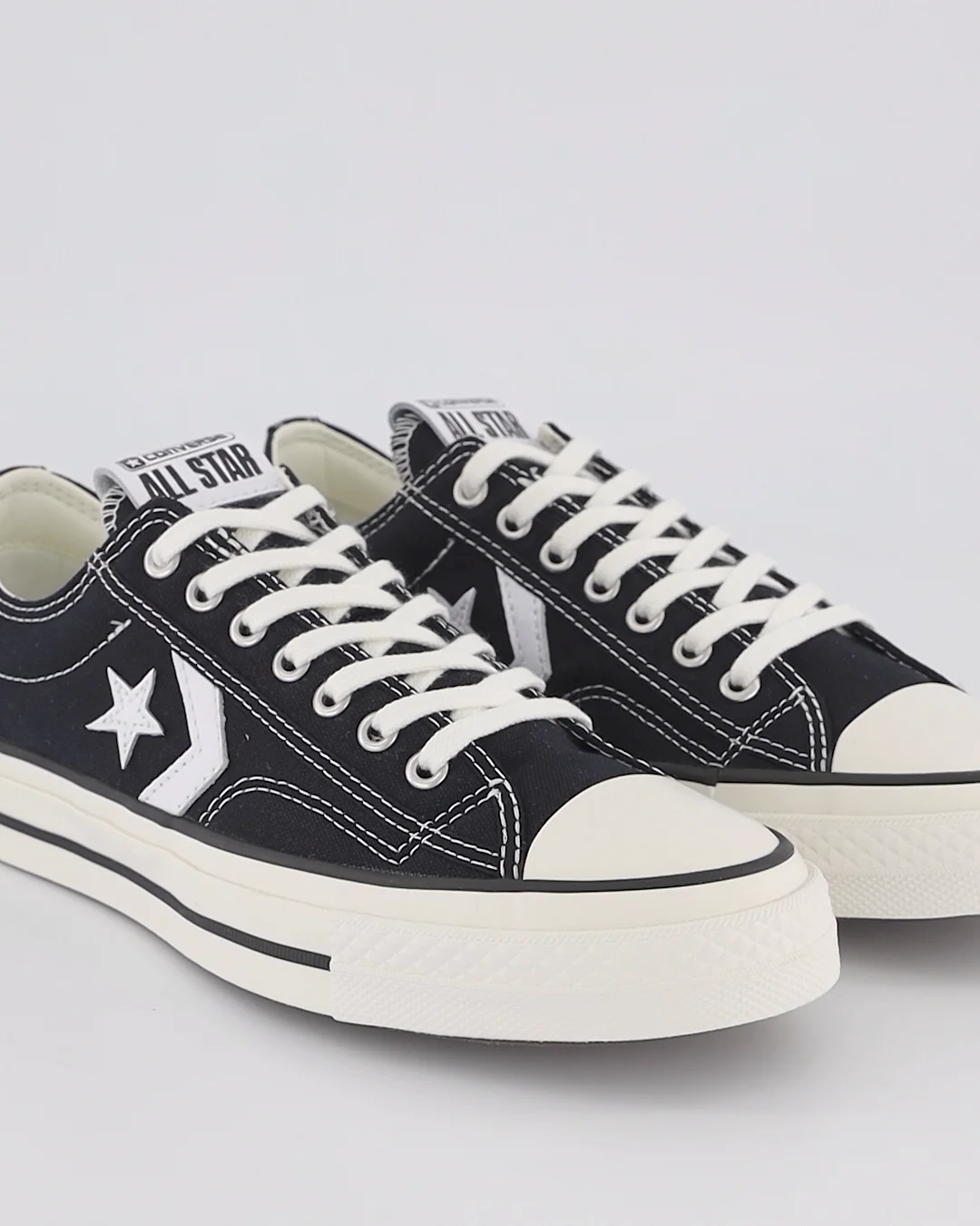 Shop Converse Star Player 76 Low in Black