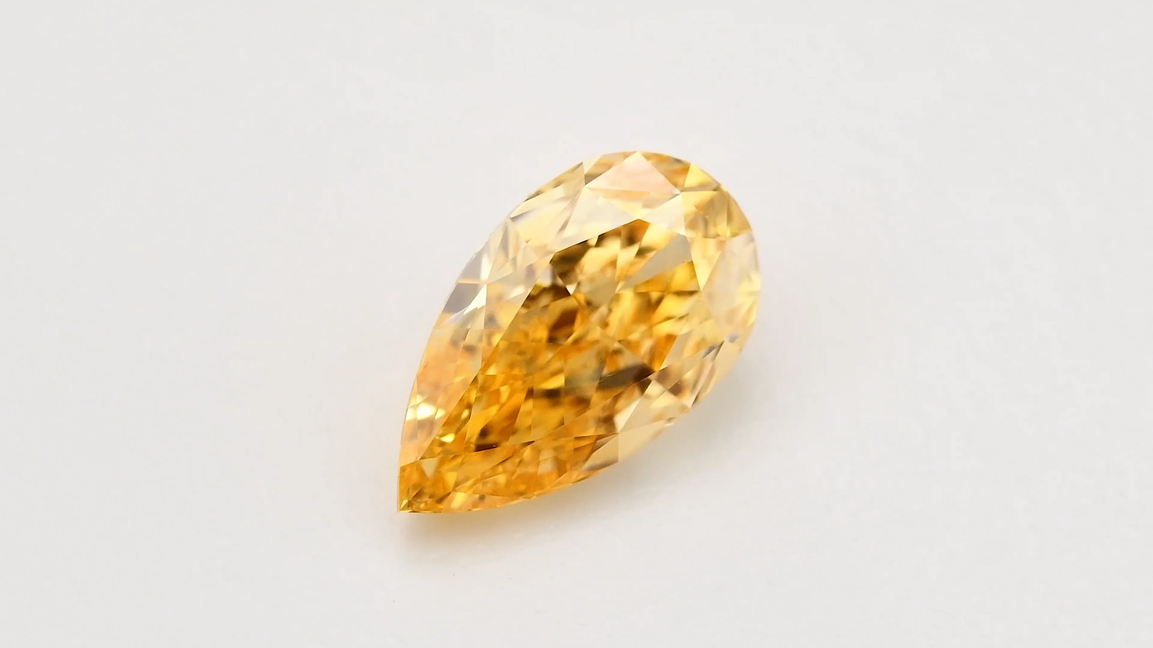 0.66 Carat Fancy Intense Yellowish Orange Pear Diamond VS2 GIA