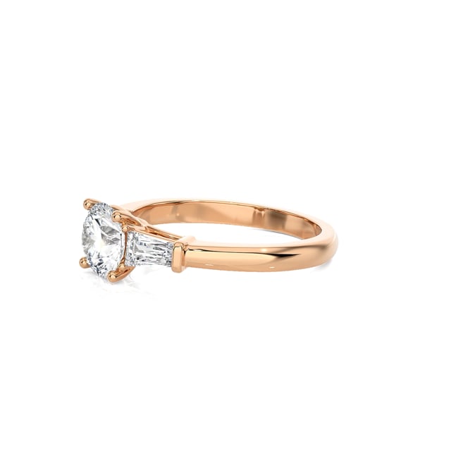 2.00 carat trilogy ring in red gold with round lab grown diamond and lab grown tapered baguettes