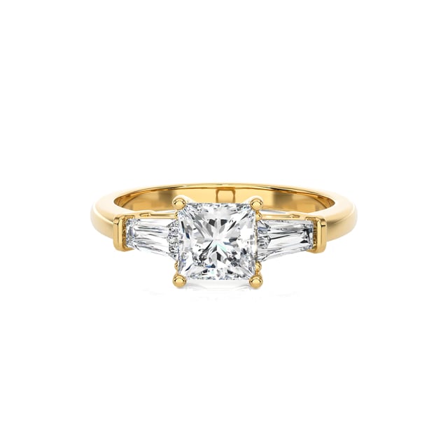 3.00 carat trilogy ring in yellow gold with a lab grown princess diamond and lab grown tapered baguettes