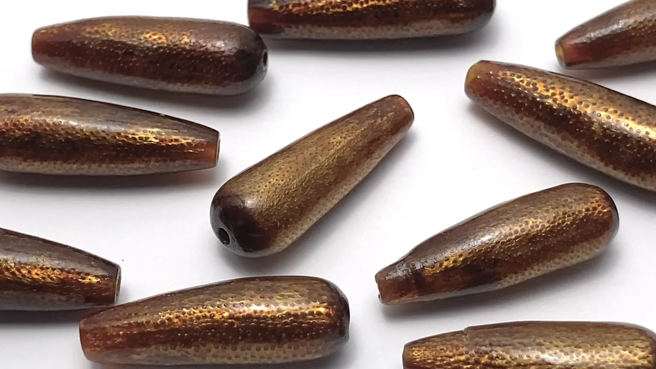 ゴールデンコーラル（金珊瑚） ドロップ（プレーン）20×6mm 【貫通穴