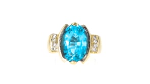 C. 1980 Vintage 7.50 Carat London Blue Topaz and .15 ct. t.w. Diamond Ring in 14kt Yellow Gold