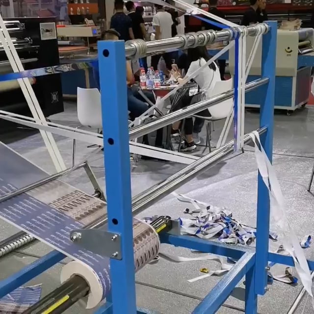 Large format ribbon or lanyard roller heat press machine.
