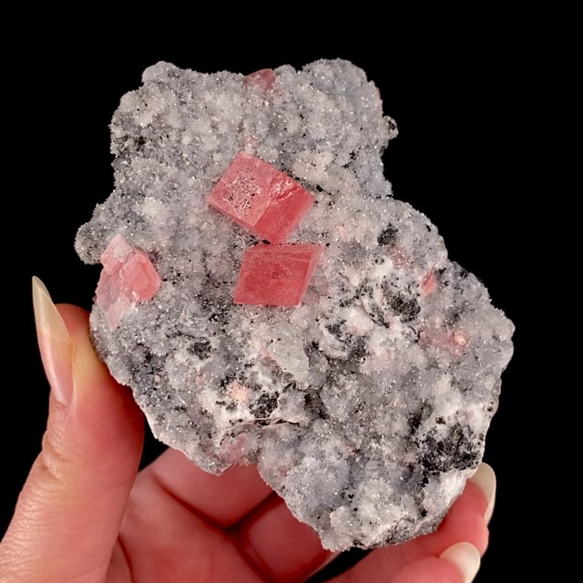 Rhodochrosite on Quartz