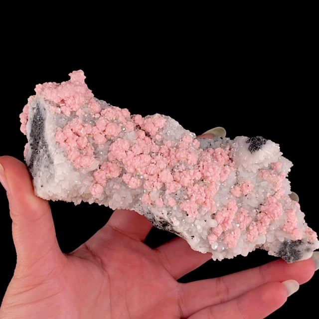 Rhodochrosite on Quartz