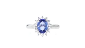 C. 1990 Vintage 1.41 Carat Sapphire and .31 ct. t.w. Diamond Ring in Platinum