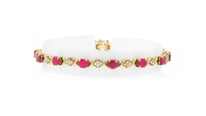 C. 1990 Vintage 6.14 ct. t.w. Ruby and .45 ct. t.w. Diamond Bracelet in 18kt Yellow Gold