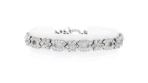 C. 1990 Vintage 2.85 ct. t.w. Diamond Oval and Flower-Link Bracelet in 14kt White Gold