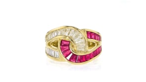 C. 1980 Vintage 1.28 ct. t.w. Ruby and .95 ct. t.w. Diamond Swirl Ring in 18kt Yellow Gold