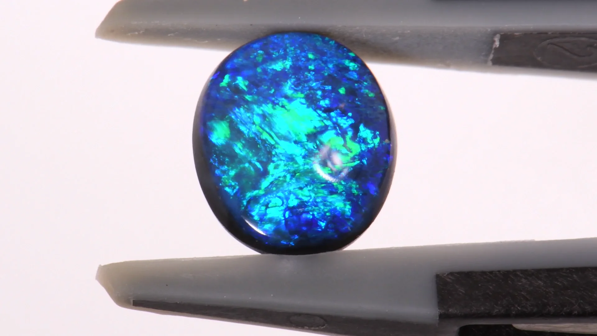 0.98ct Natural Black Opal - Oval Blue Green - Opal Galaxy