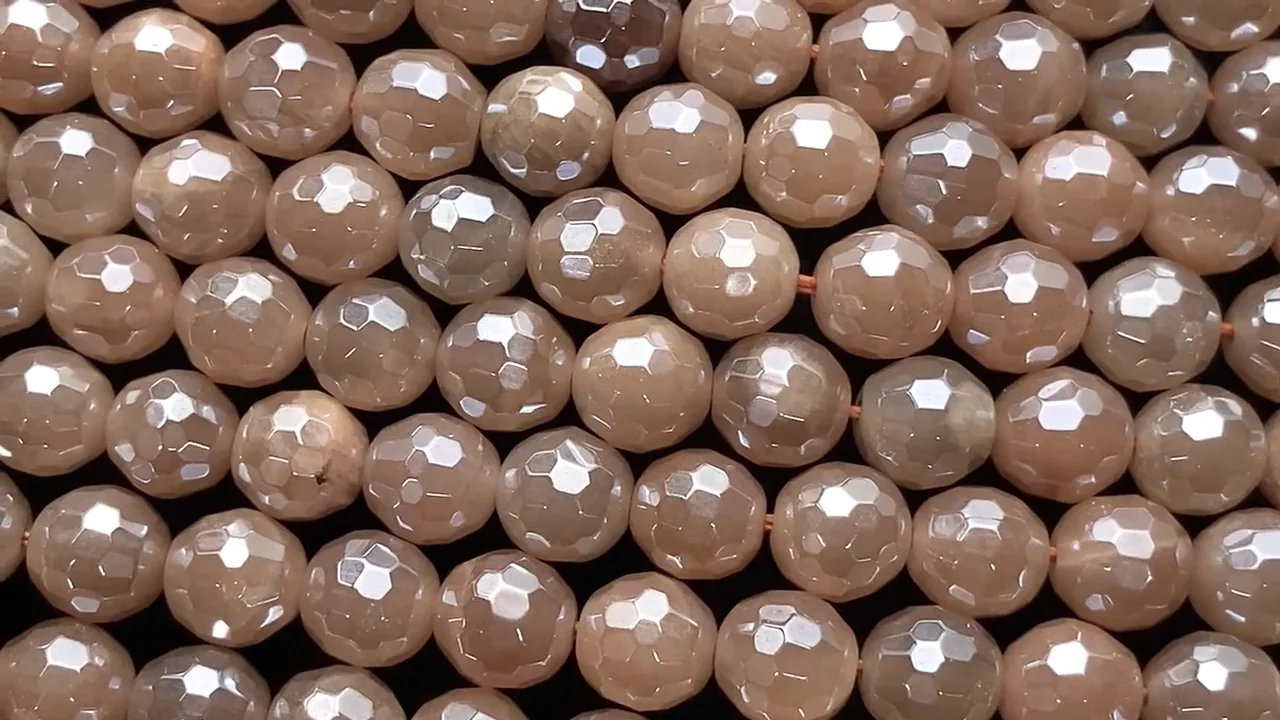 オレンジムーンストーン 128面ラウンドカット6mm コーティング 1連