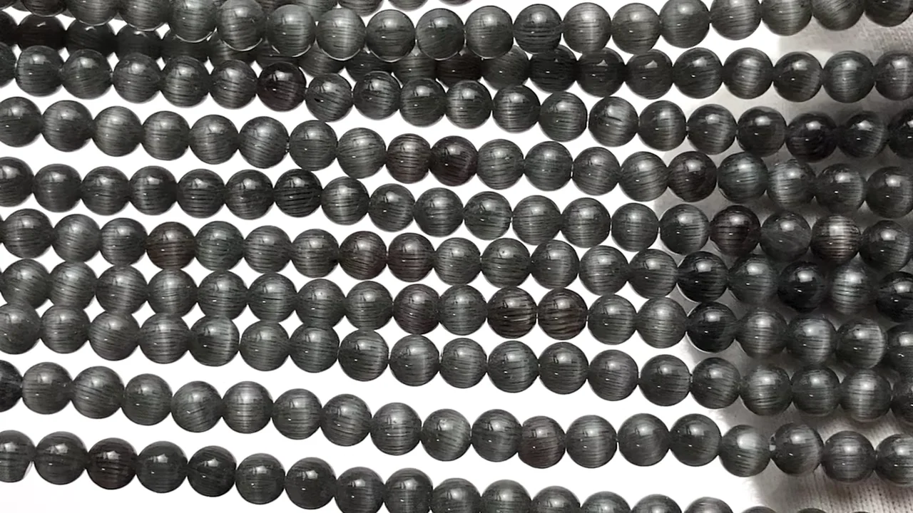 ブラックカラーキャッツアイ ラウンド4mm 1連｜天然石ビーズの卸問屋