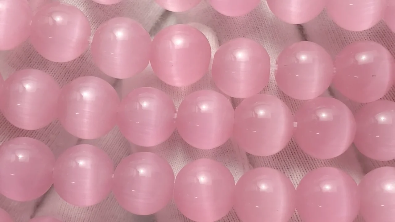 ピンクカラーキャッツアイ ラウンド10mm 1連｜天然石ビーズの卸問屋