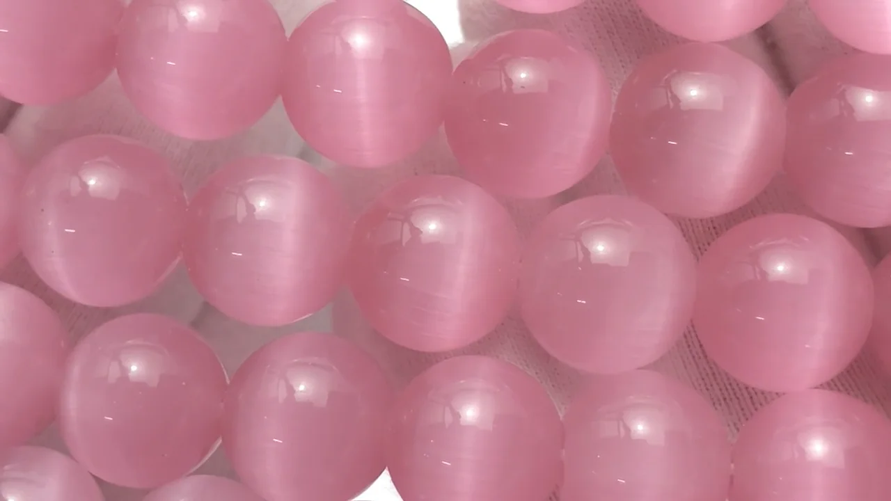 ピンクカラーキャッツアイ ラウンド12mm 1連｜天然石ビーズ・ルース