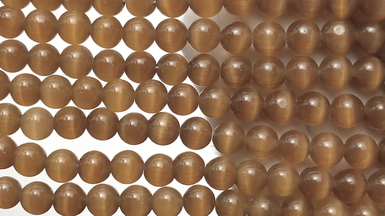 ブラウンカラーキャッツアイ ラウンド6mm 1連｜天然石ビーズの卸問屋