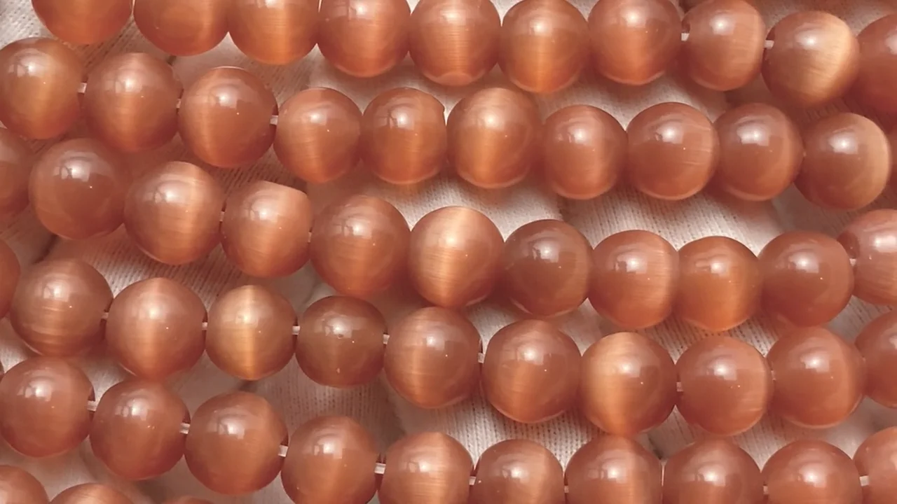 ダークオレンジカラーキャッツアイ ラウンド8mm 1連｜天然石ビーズの卸