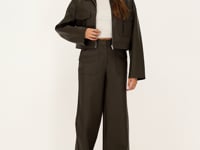 Dark green leather look trousers with pockets | My Jewellery
