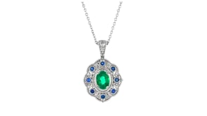 .70 Carat Emerald and .10 ct. t.w. Sapphire Pendant Necklace with Diamond Accents in Sterling Silver