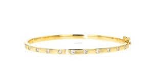 .50 ct. t.w. Diamond Station Bangle Bracelet in 14kt Yellow Gold