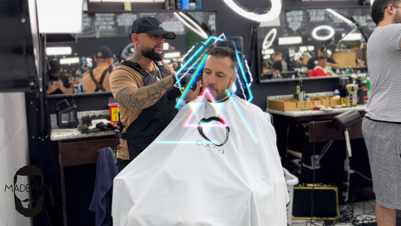 Barber giving kid a haircut - Made Men Studios
