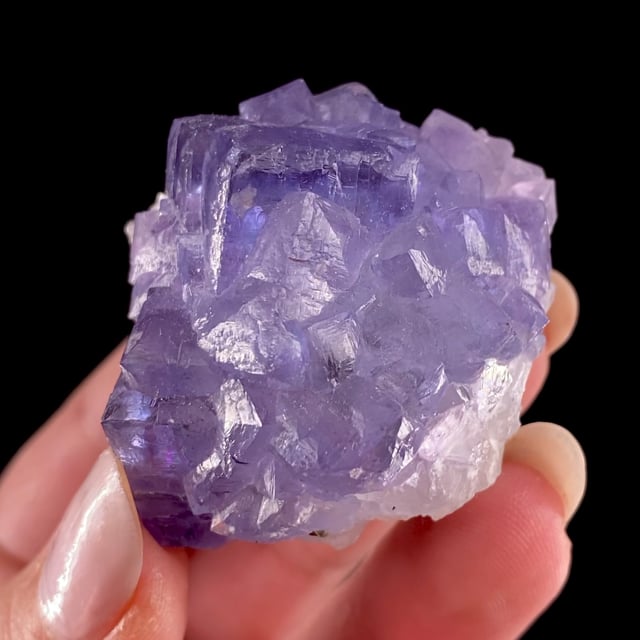 Fluorite (gemmy crystals with tetrahexahedral faces)