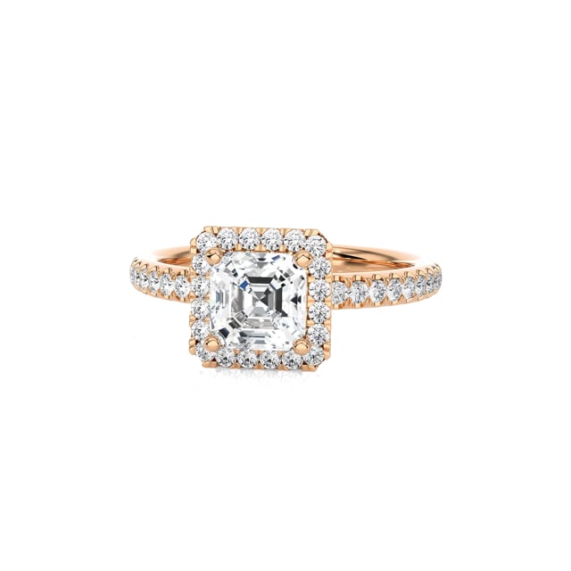 2.00 carat solitaire halo ring with an asscher cut diamond in red gold and round diamonds