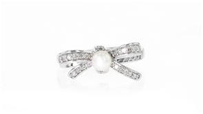 4-4.5mm Cultured Pearl and .25 ct. t.w. Diamond Bow Ring in Sterling Silver