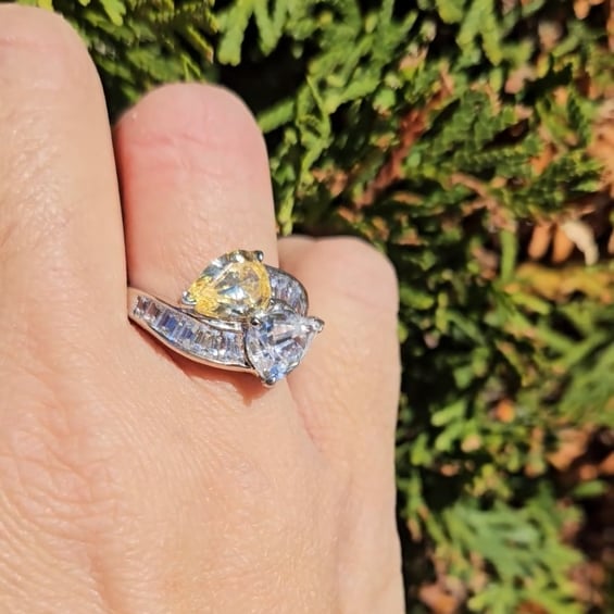 2 Offset 12x10mm Pear-Shape Cut stones (7ct) in the Center  with 16 Baguette Cut stones (2ct) on the side. T12598-CAN-CZ-14K