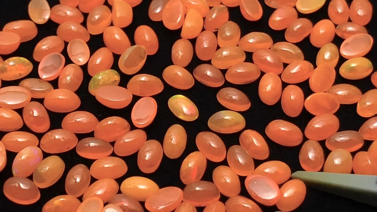 エチオピア産オレンジカラーオパール オーバル カボション5×3mm 10個