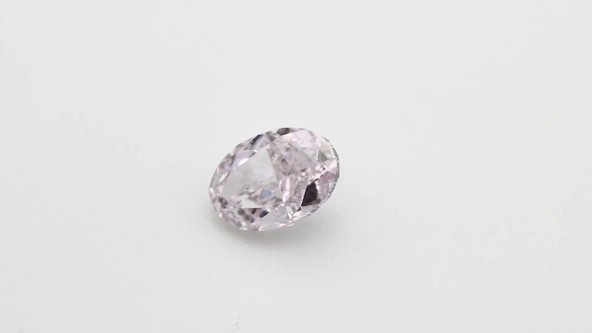 0.50 Carat Fancy Light Purplish Pink Oval Diamond SI1 GIA