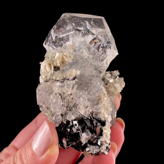 Beryl var: Goshenite (GEM crystal) with Cassiterite and Muscovite