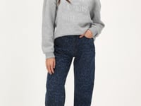 Blue denim jeans with leopard print