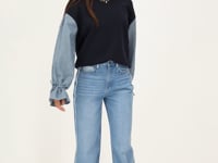 light blue wide leg jeans with contrasting pocket