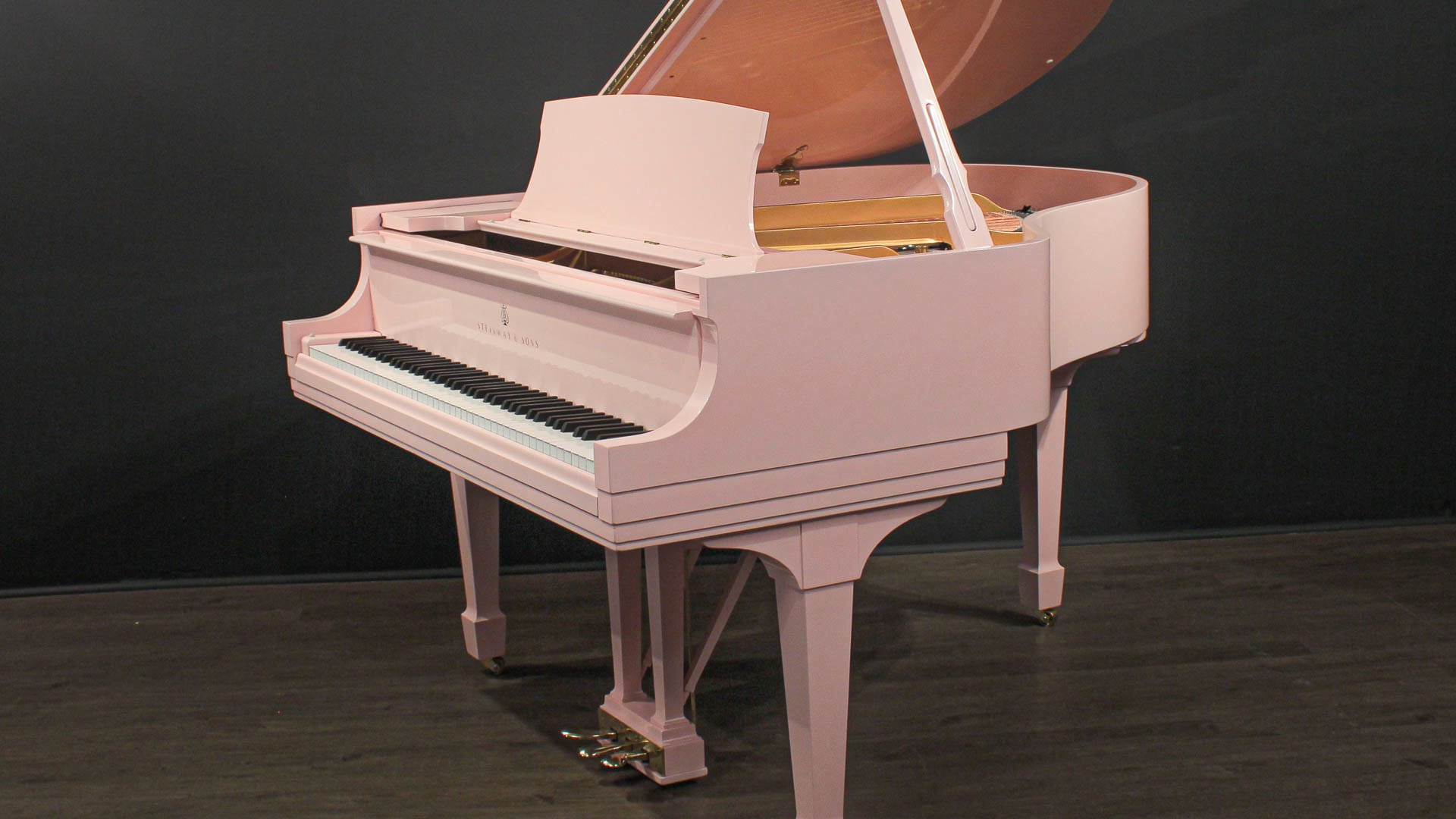 Baby pink grand piano on sale