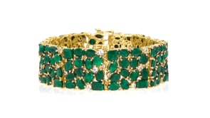 55.50 ct. t.w. Emerald and 1.80 ct. t.w. White Topaz Bracelet in 18kt Gold Over Sterling