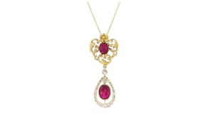 C. 1980 Vintage 3.15 ct. t.w. Ruby and .35 ct. t.w. Diamond Drop Pendant Necklace in 18kt Yellow Gold