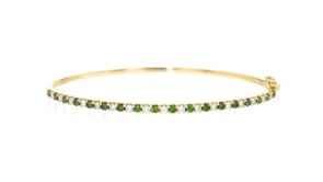 C. 1990 Vintage 1.03 ct. t.w. Green and White Diamond Bangle Bracelet in 18kt Yellow Gold