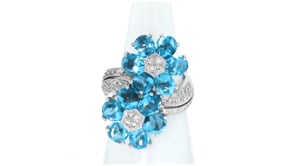 C. 1990 Vintage 9.52 ct. t.w. Swiss Blue Topaz Flower Bypass Ring with .40 ct. t.w. Diamonds in 18kt White Gold