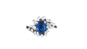 C. 1980 Vintage 1.21 Carat Sapphire and .56 ct. t.w. Diamond Ring in Platinum