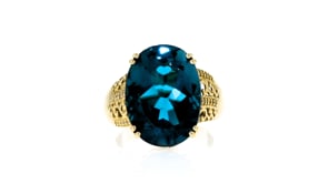 15.00 Carat London Blue Topaz Ring with .10 ct. t.w. Diamonds in 14kt Yellow Gold