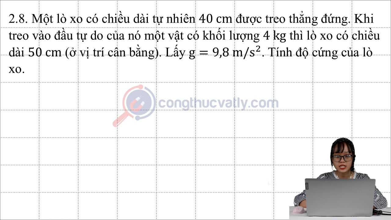 Một lò xo có chiều dài tự nhiên 40 cm được treo thẳng đứng.